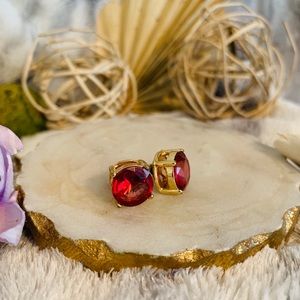Large red studs